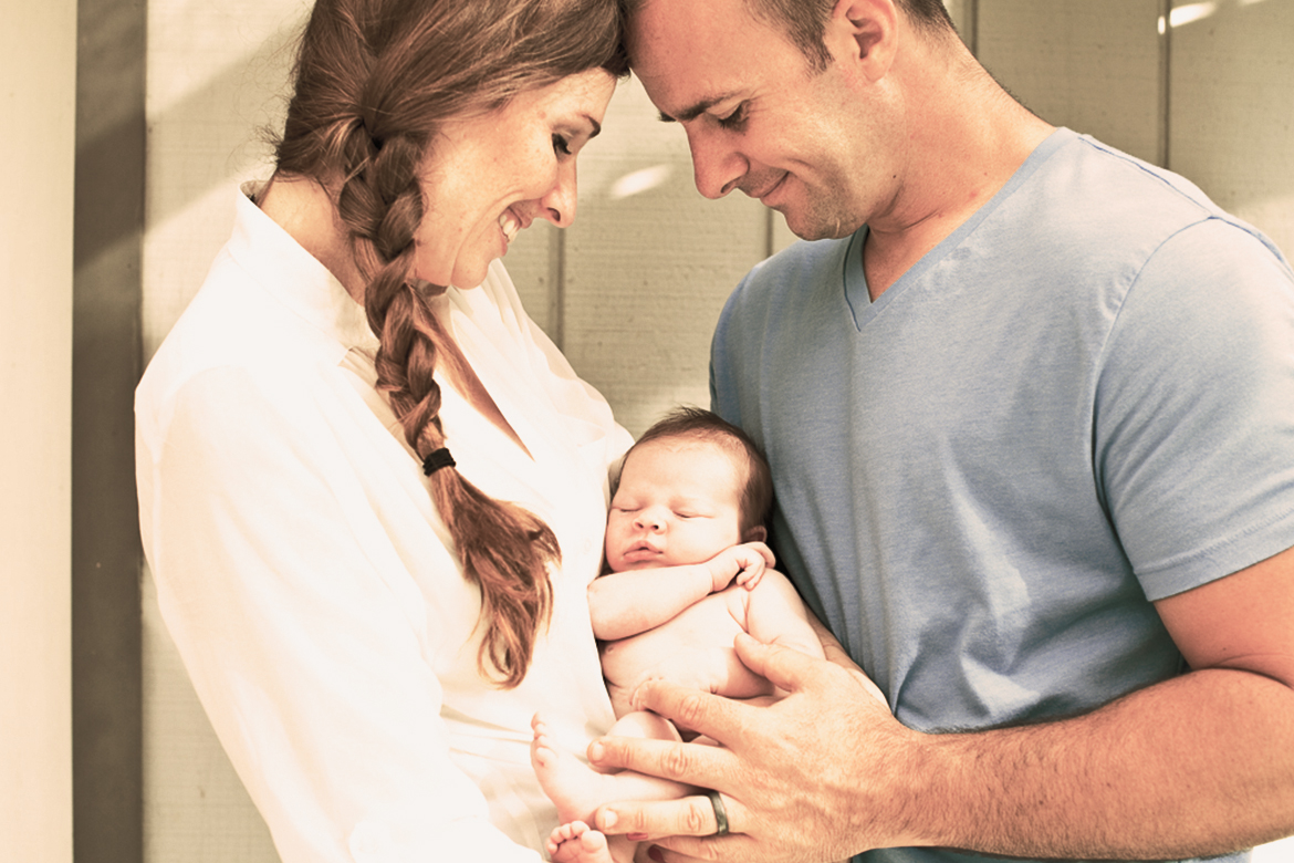 Parents Holding Baby