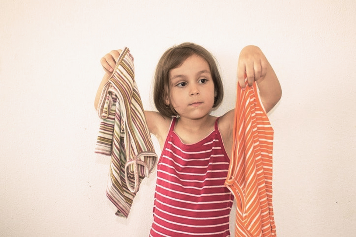 Girl Choosing Her Outfits